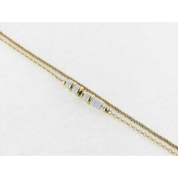 Lotus pulsera acero chapado piedras